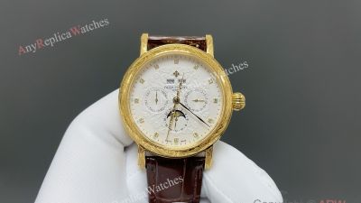 Patek Philippe Calatrava CH29-535 Movement 42mm White/Champagne Face Engraved YG Bezel Watch